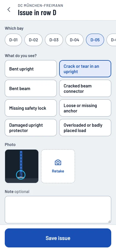 Report an issue: bay D-05, a tear or crack, with a photo; the app says to stop using the bay and notify.